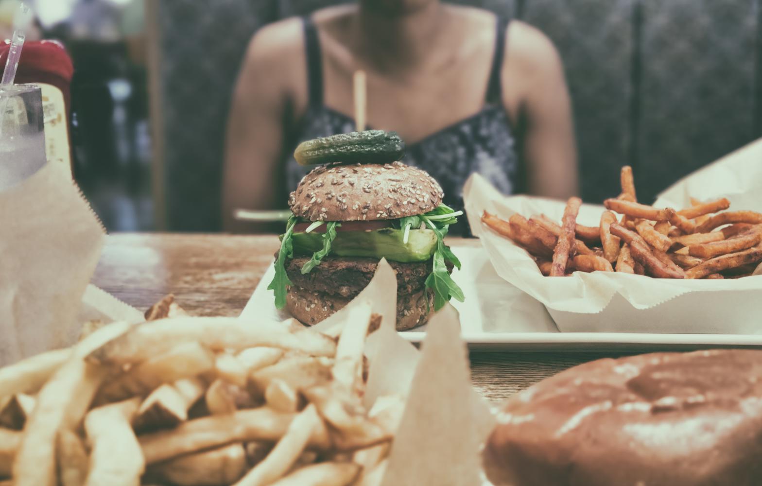 Woman surrounding by food